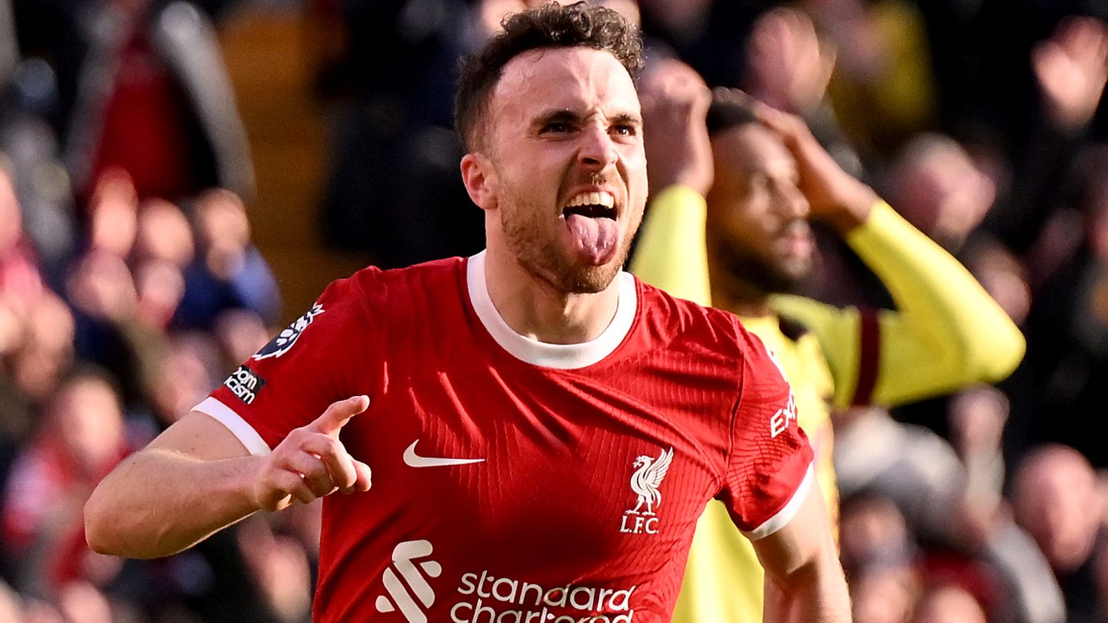 Liverpool regain top spot with controversial victory over Burnley